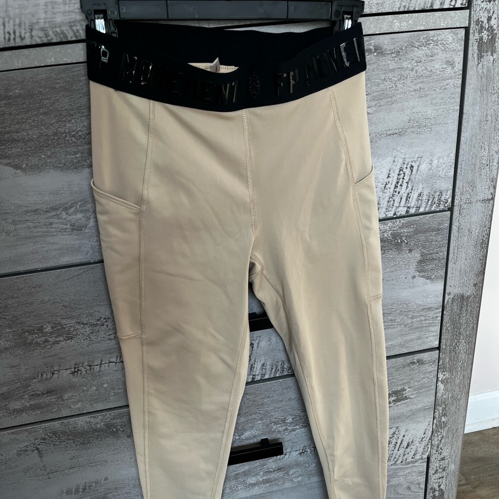 Free people movement leggings tan color NWOT. Size S